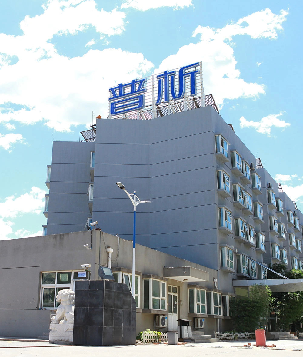 Building with PERSEE sign under blue sky